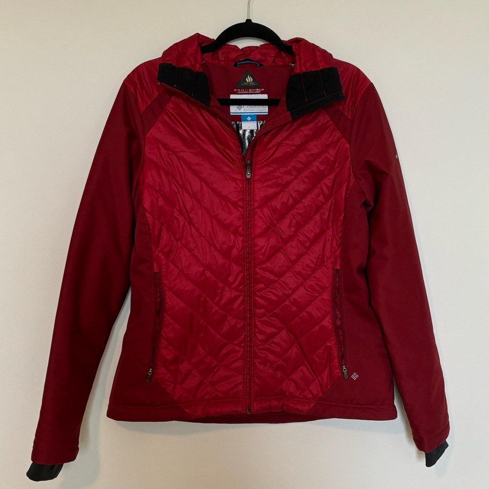 Red women’s Columbia ski jacket.